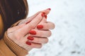 Girls hands in cold in winter day